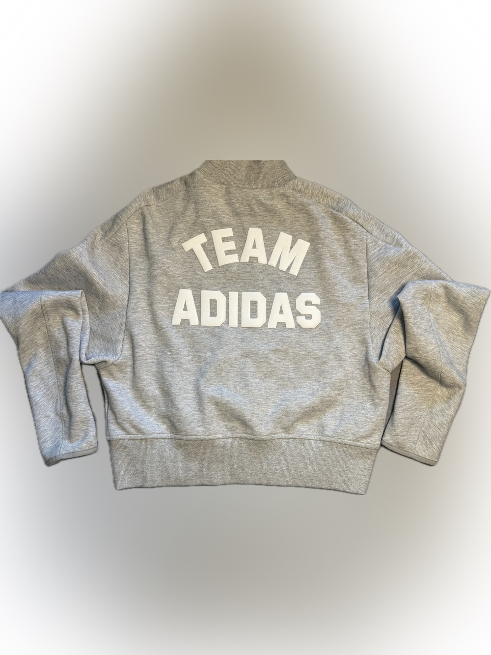 Team adidas Gray Sweatshirt with White Raised Lettering on back. Women’s M